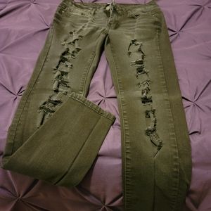 Black destructed skinny jeans